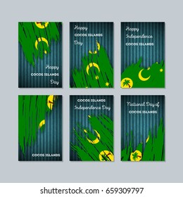 Cocos Islands Patriotic Cards for National Day. Expressive Brush Stroke in National Flag Colors on dark striped background. Cocos Islands Patriotic Vector Greeting Card.
