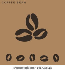 Coffee bean. Hot drink. Logo. Black coffee beans on brown background. Vector illustration EPS10