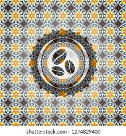 coffee bean icon inside arabesque style badge. arabic decoration.
