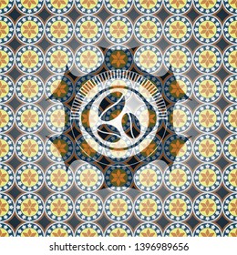 coffee bean icon inside arabic style badge. Arabesque decoration.