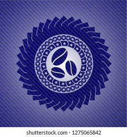 coffee bean icon inside badge with denim background