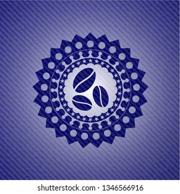 coffee bean icon inside badge with denim background