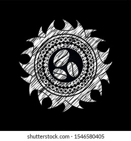 coffee bean icon inside chalkboard emblem on black board