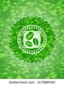 coffee bean icon inside green mosaic emblem