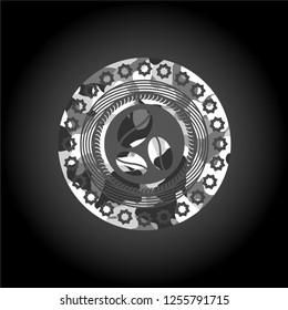 coffee bean icon inside grey camouflaged emblem