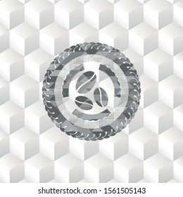 coffee bean icon inside grey badge with geometric cube white background