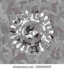 coffee bean icon inside grey camo texture. 