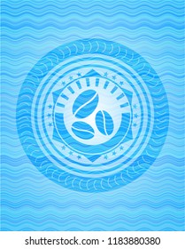 coffee bean icon inside light blue water emblem.