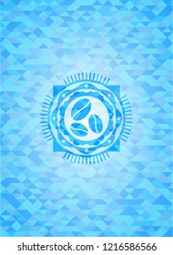 coffee bean icon inside light blue emblem with mosaic background