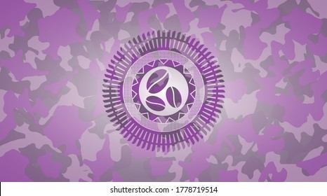 coffee bean icon inside pink camo emblem. 