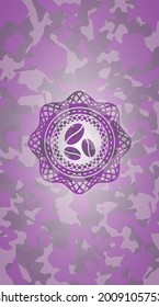 coffee bean icon inside pink and purple camouflage emblem. 