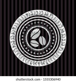 coffee bean icon inside silvery emblem or badge