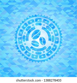 coffee bean icon inside sky blue emblem with mosaic background