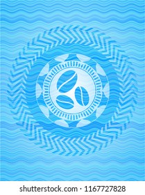 coffee bean icon inside water wave representation emblem.