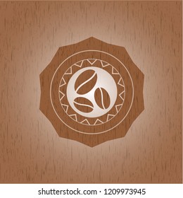 coffee bean icon inside wood badge or emblem