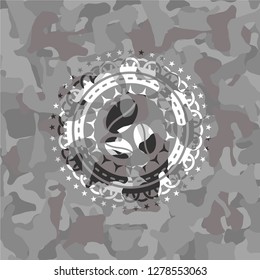 coffee bean icon on grey camouflaged pattern