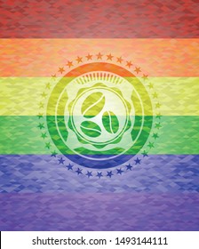 coffee bean icon on mosaic background with the colors of the LGBT flag