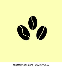 Coffee bean logo. Coffee beans isolated on a yellow background