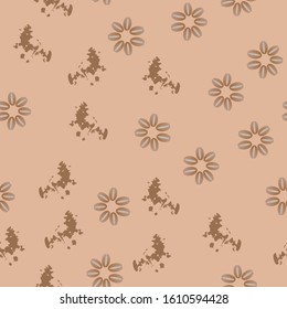 Coffee beans in the form of a flower and chocolate splashes arranged in random order