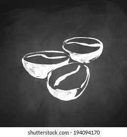 Coffee beans. Hand drawn sketch on chalkboard background. Vector illustration. isolated.