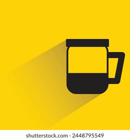 coffee cup with drop shadow on yellow background