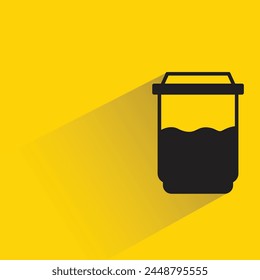 coffee cup with drop shadow on yellow background