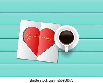 coffee cup and good morning  card on arctic blue table
