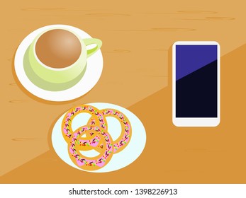 The coffee cup has a donuts and a mobile phone on a brown wood table.High angle image