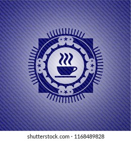 coffee cup icon inside badge with denim background