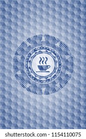 coffee cup icon inside blue badge with geometric pattern.