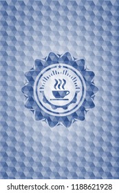 coffee cup icon inside blue polygonal emblem.