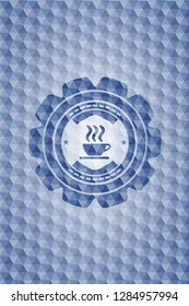 coffee cup icon inside blue emblem with geometric background.