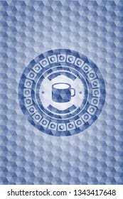 coffee cup icon inside blue emblem with geometric pattern.