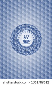 coffee cup icon inside blue hexagon emblem.