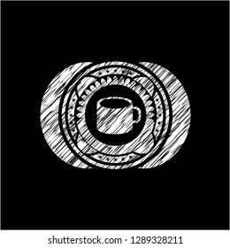 coffee cup icon inside chalkboard emblem on black board