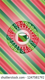 coffee cup icon inside christmas colors badge.