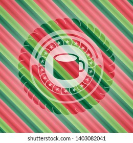 coffee cup icon inside christmas colors badge.