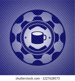 coffee cup icon inside emblem with jean texture