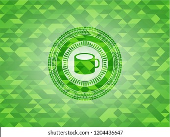coffee cup icon inside green mosaic emblem