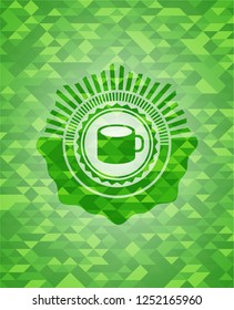 coffee cup icon inside green mosaic emblem
