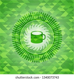 coffee cup icon inside green emblem. Mosaic background