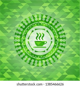 coffee cup icon inside green emblem. Mosaic background