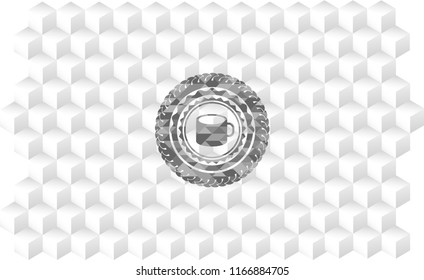 coffee cup icon inside grey emblem with geometric cube white background