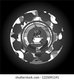 coffee cup icon inside grey camouflage emblem