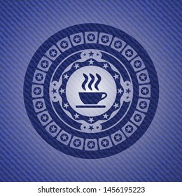 coffee cup icon inside jean or denim emblem or badge background