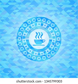coffee cup icon inside light blue emblem with mosaic background