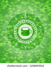 coffee cup icon inside realistic green emblem. Mosaic background