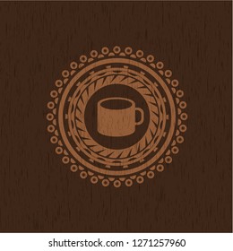 coffee cup icon inside retro wood emblem