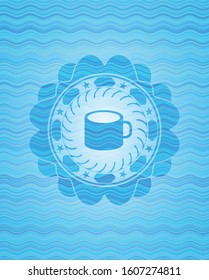 coffee cup icon inside water concept style emblem.