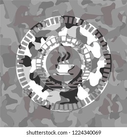 coffee cup icon on grey camo texture